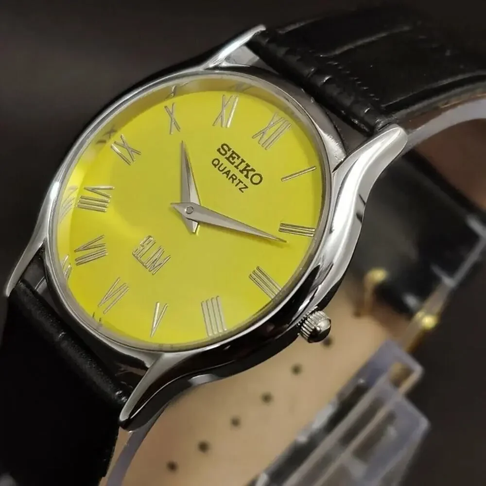 Vintage Style Seiko Quartz Mens Silver Watch & Yellow accents W/ Metal Strap